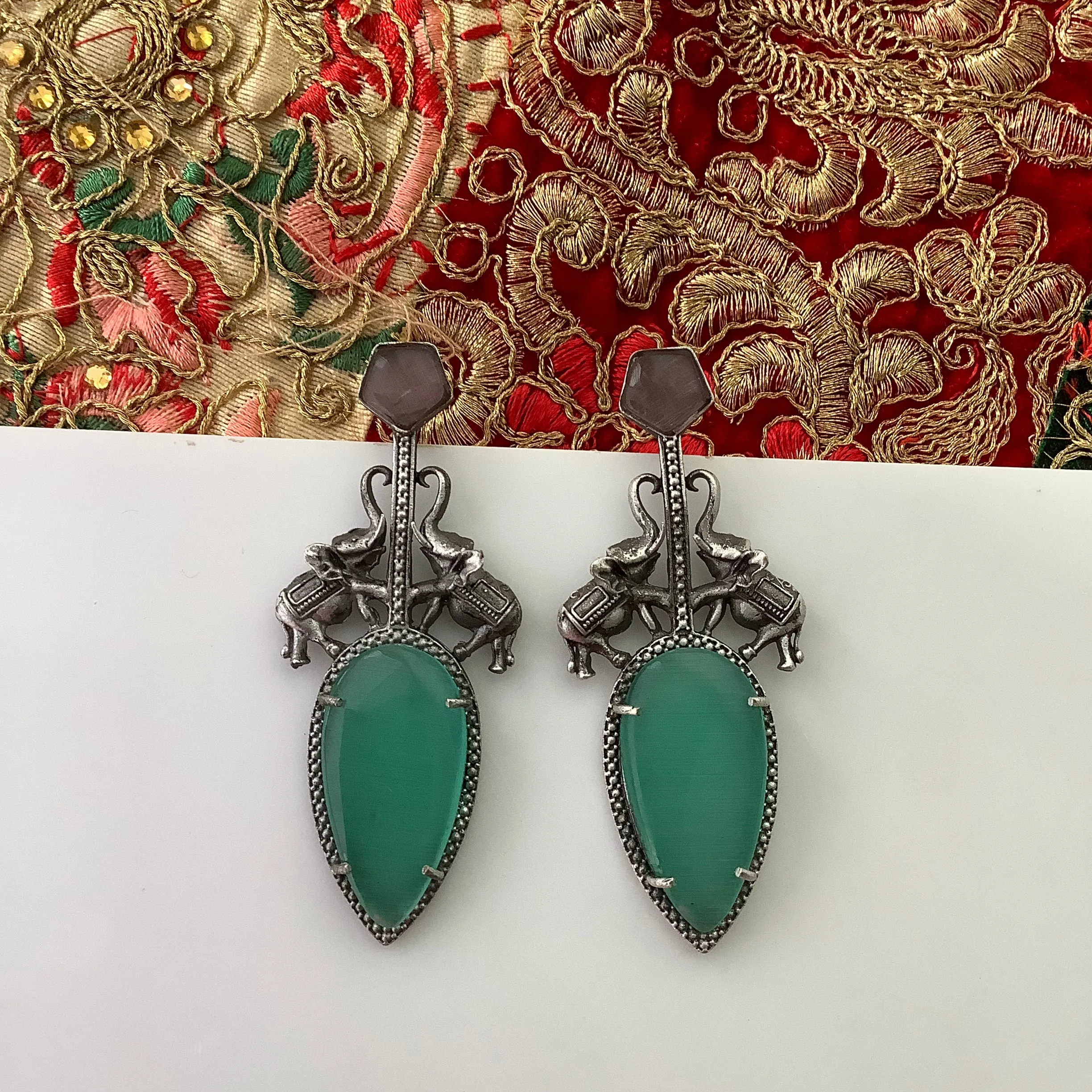 Salvanity German Silver Gaja Varchasva (Elephant Supremacy) - Earrings (Aqua Monalisa Stone)